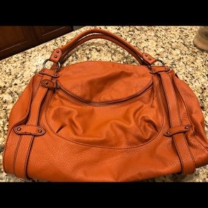 Large burnt orange handbag!